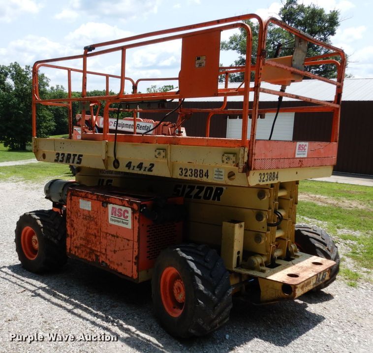 image for item II9608 2000 JLG 33RTS  scissor lift