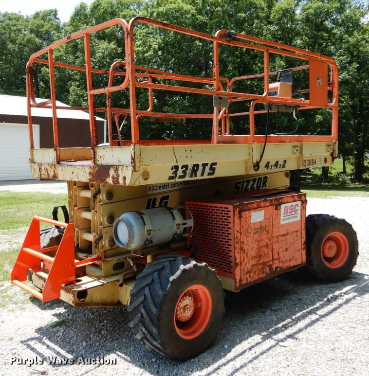image for item II9608 2000 JLG 33RTS  scissor lift