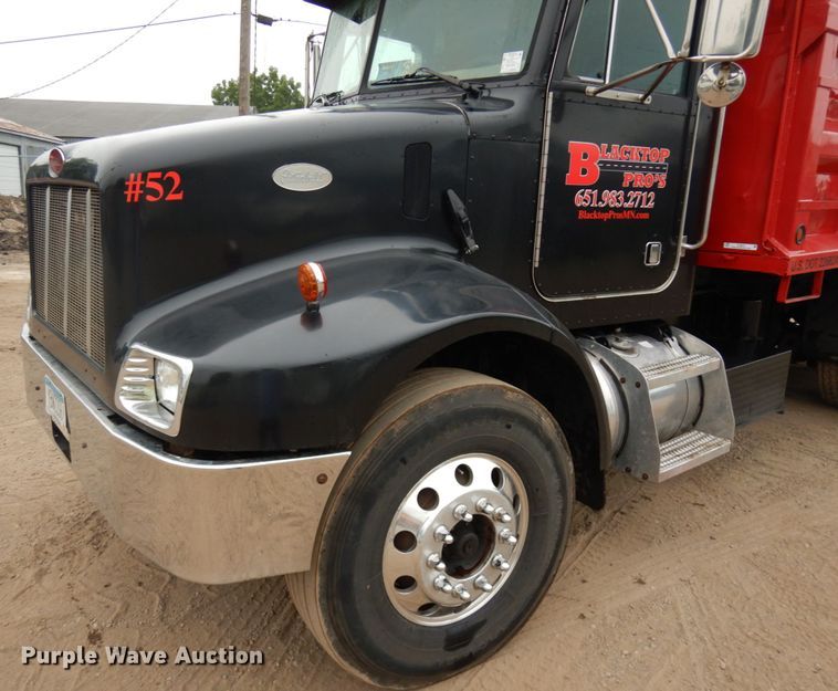 image for item IL9873 1999 Peterbilt 330  dump truck