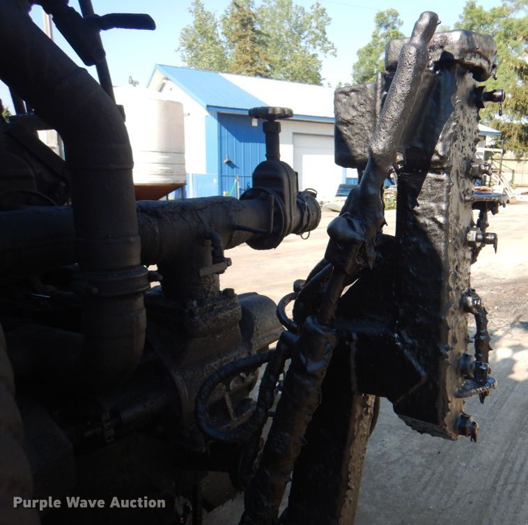 image for item JY9774 1992 Mack Midliner  oil distributor truck