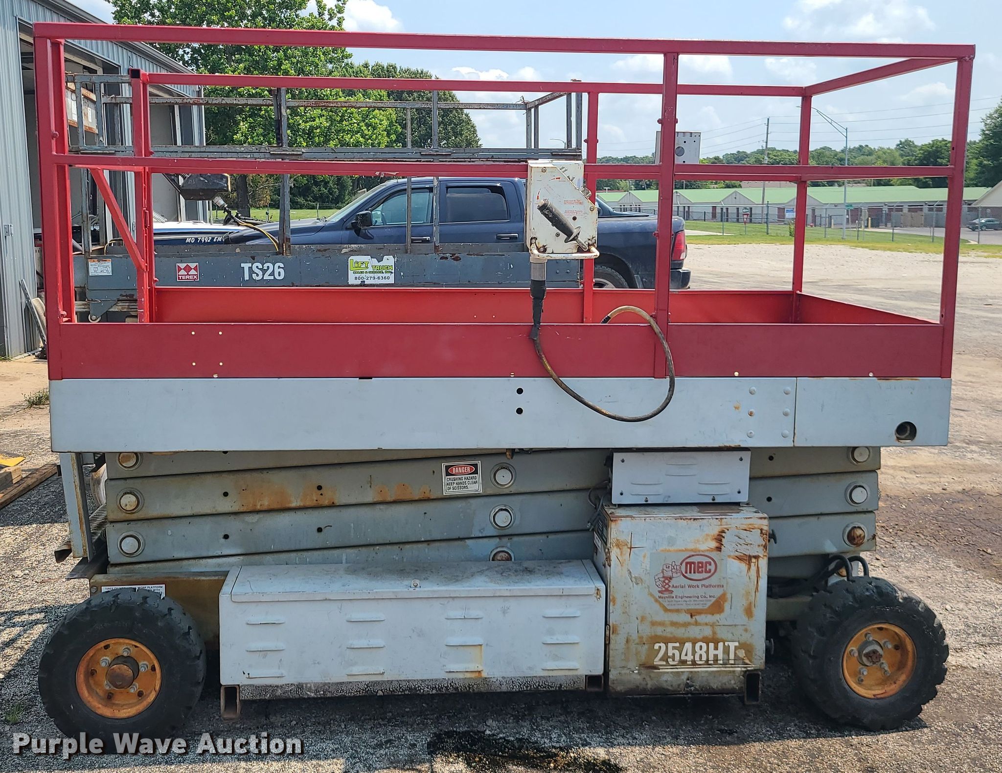Mec 2548HT scissor lift in Blue Springs, MO Item IC9868 sold Purple