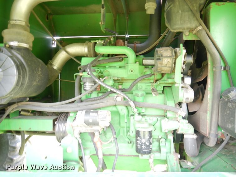 image for item IW9914 1998 John Deere 4890  windrower