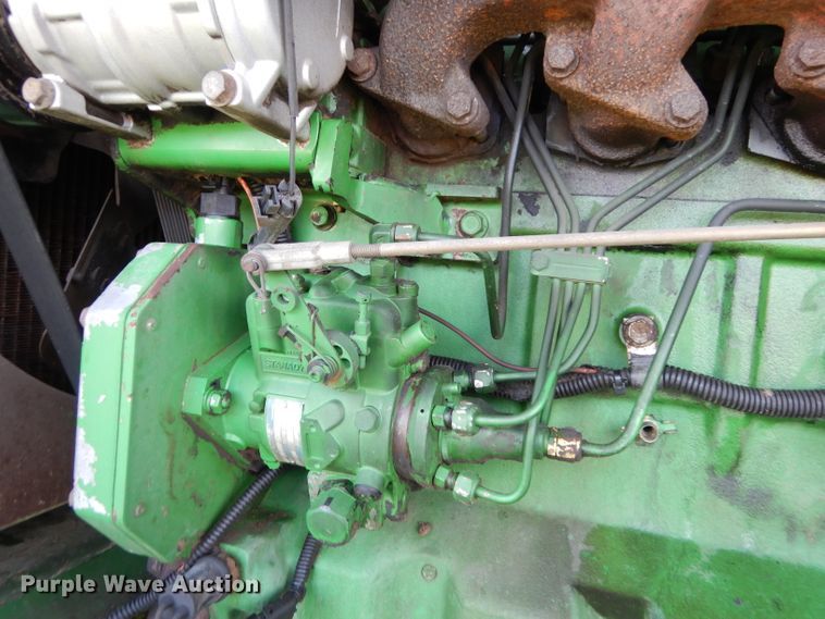 image for item IW9914 1998 John Deere 4890  windrower