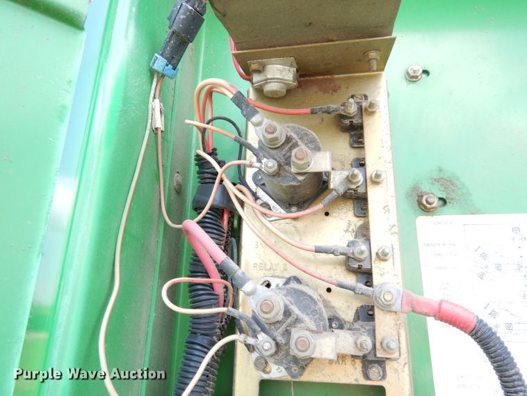 image for item IW9914 1998 John Deere 4890  windrower