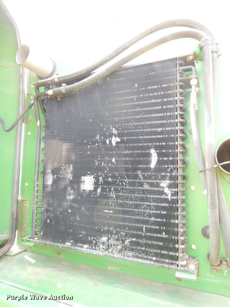 image for item IW9914 1998 John Deere 4890  windrower