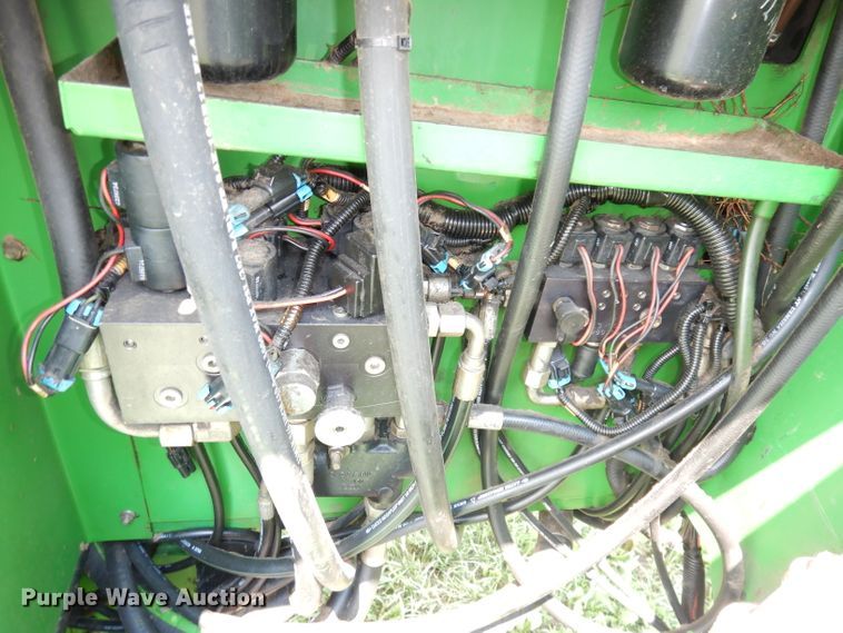 image for item IW9914 1998 John Deere 4890  windrower