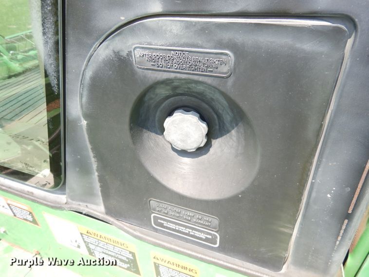 image for item IW9914 1998 John Deere 4890  windrower