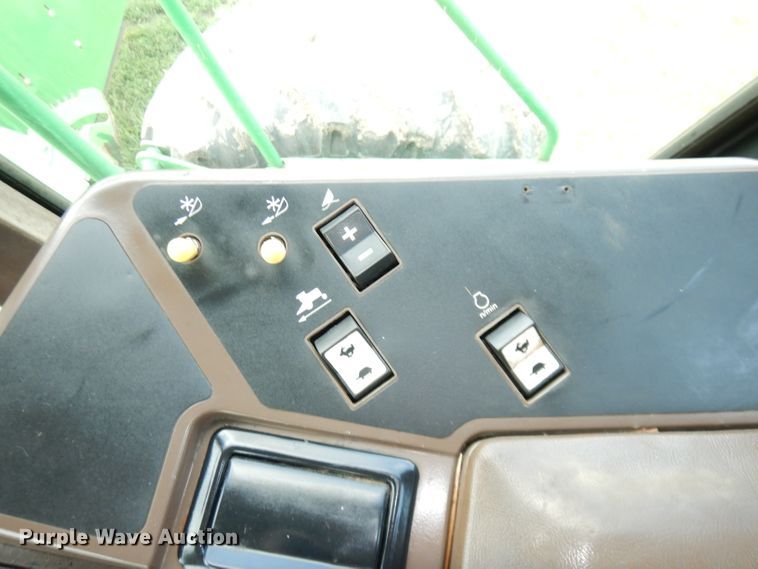 image for item IW9914 1998 John Deere 4890  windrower