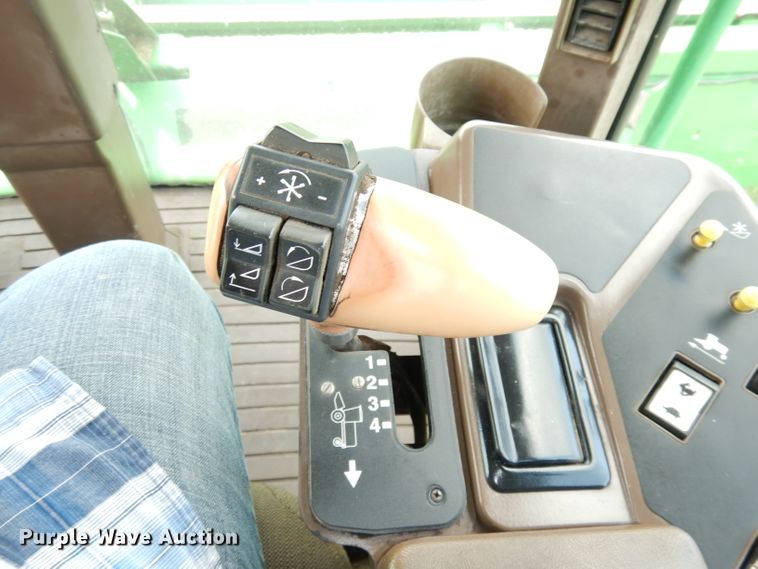 image for item IW9914 1998 John Deere 4890  windrower