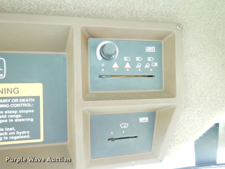 image for item IW9914 1998 John Deere 4890  windrower