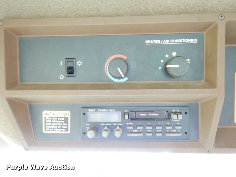 image for item IW9914 1998 John Deere 4890  windrower