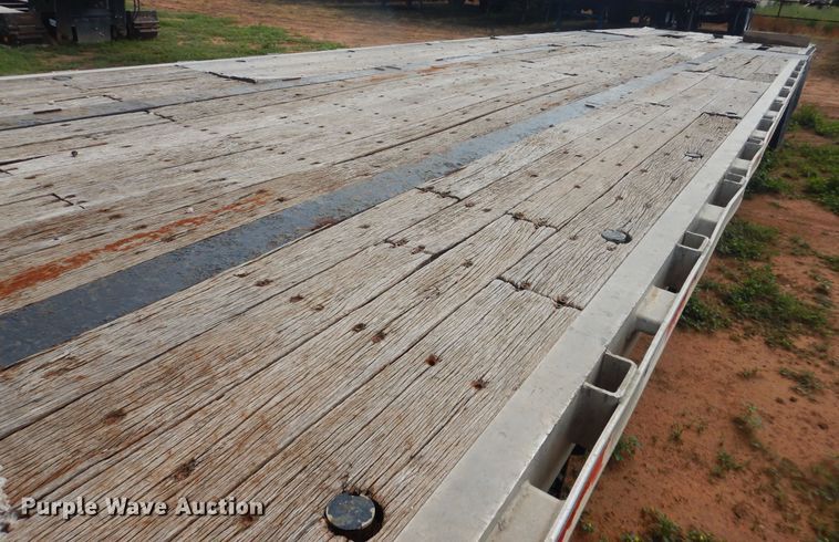 image for item DM6257 1999 Transcraft DTL2000  drop deck trailer