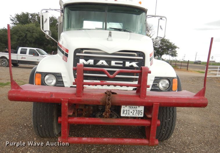 image for item DM6277 2007 Mack CV713  roll-off container truck