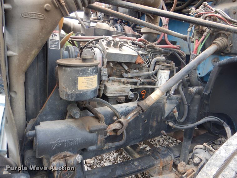 image for item HT9350 2002 Freightliner FL70  flatbed truck