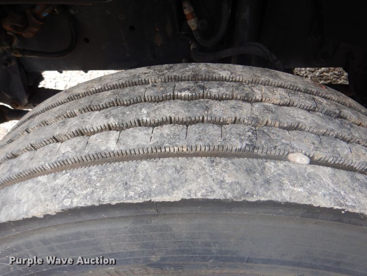 image for item HT9350 2002 Freightliner FL70  flatbed truck