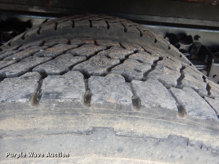 image for item HT9350 2002 Freightliner FL70  flatbed truck