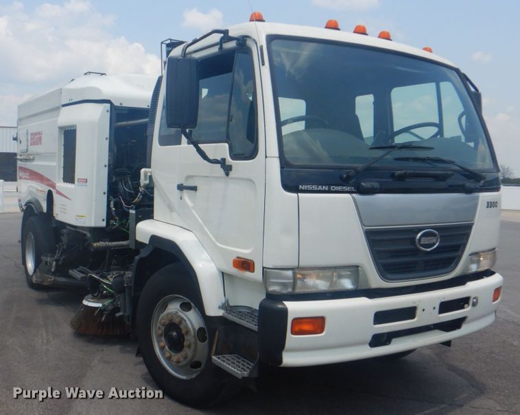 image for item IA9993 2009 Nissan UD3000  street sweeper truck