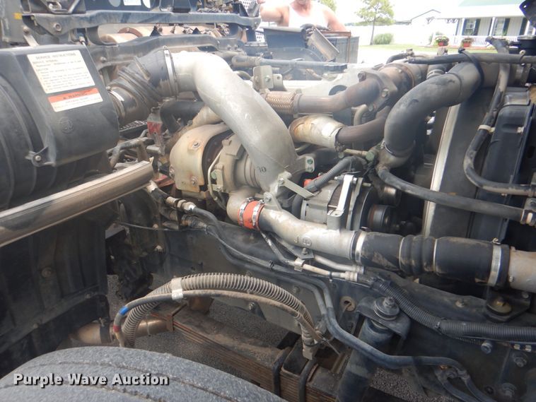 image for item IA9993 2009 Nissan UD3000  street sweeper truck