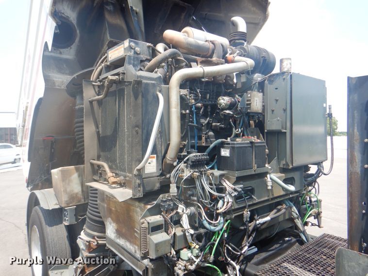 image for item IA9993 2009 Nissan UD3000  street sweeper truck