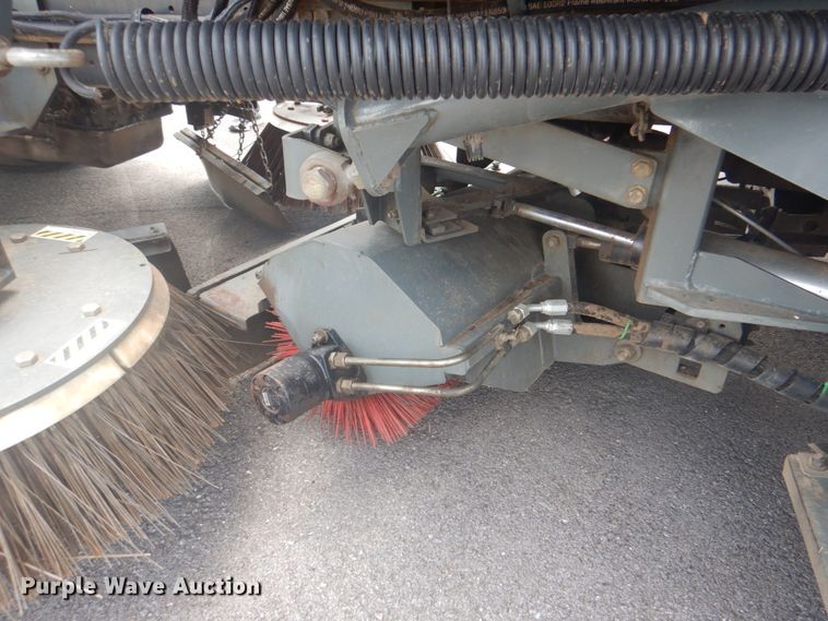 image for item IA9993 2009 Nissan UD3000  street sweeper truck