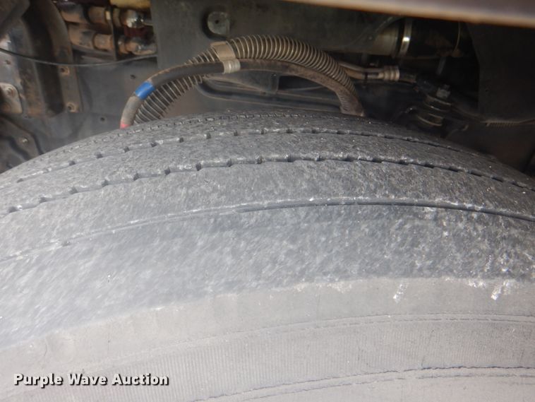 image for item IA9993 2009 Nissan UD3000  street sweeper truck