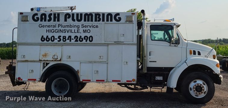 image for item IC9860 1999 Sterling L7501  utility / service truck