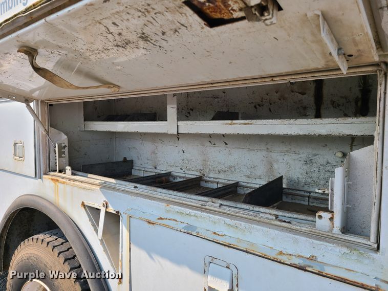 image for item IC9860 1999 Sterling L7501  utility / service truck