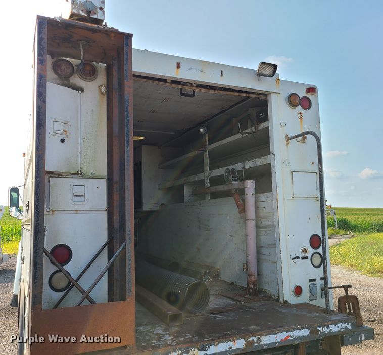 image for item IC9860 1999 Sterling L7501  utility / service truck