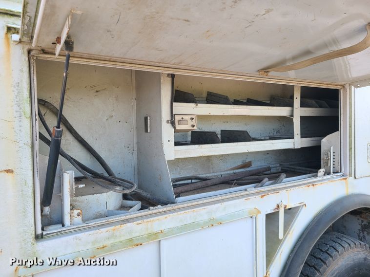 image for item IC9860 1999 Sterling L7501  utility / service truck