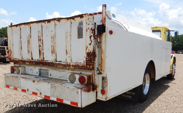 image for item DM3888 1996 Freightliner FL70  tank truck with pressure washer