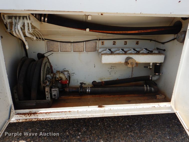 image for item DM3888 1996 Freightliner FL70  tank truck with pressure washer