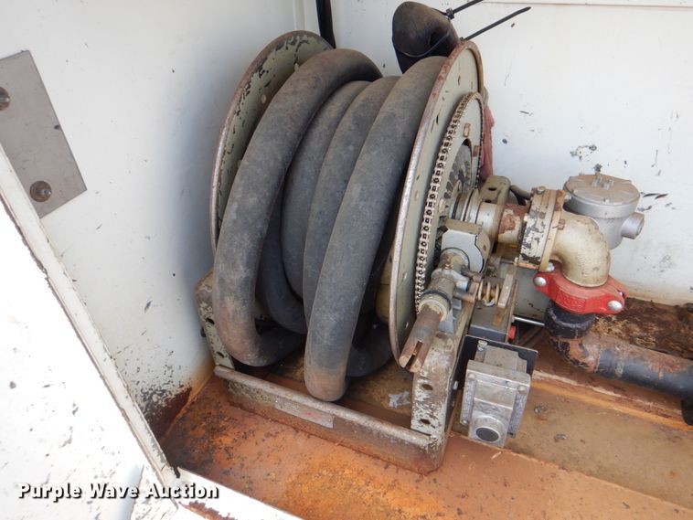 image for item DM3888 1996 Freightliner FL70  tank truck with pressure washer