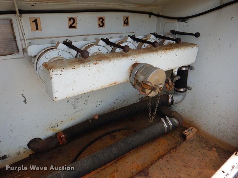 image for item DM3888 1996 Freightliner FL70  tank truck with pressure washer