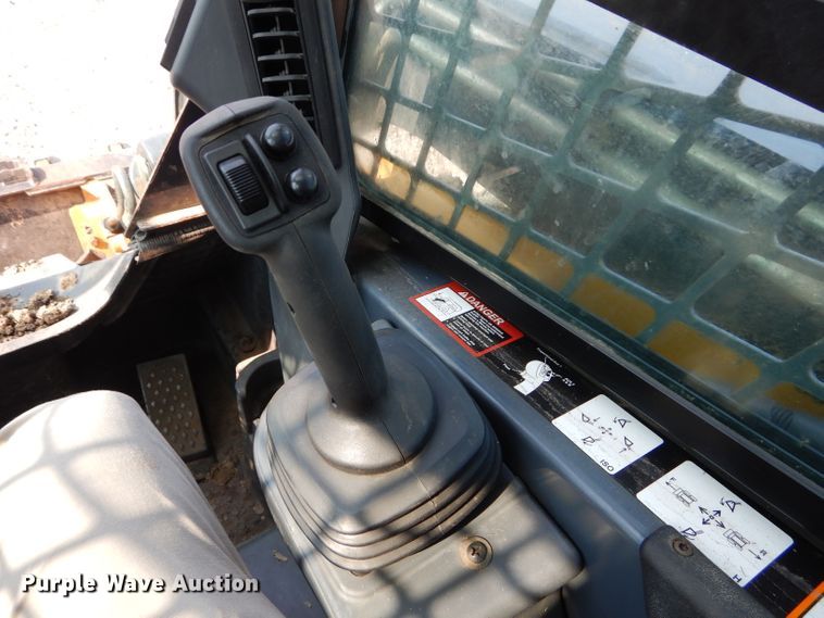 image for item DM4326 2011 John Deere 333D  tracked skid steer loader