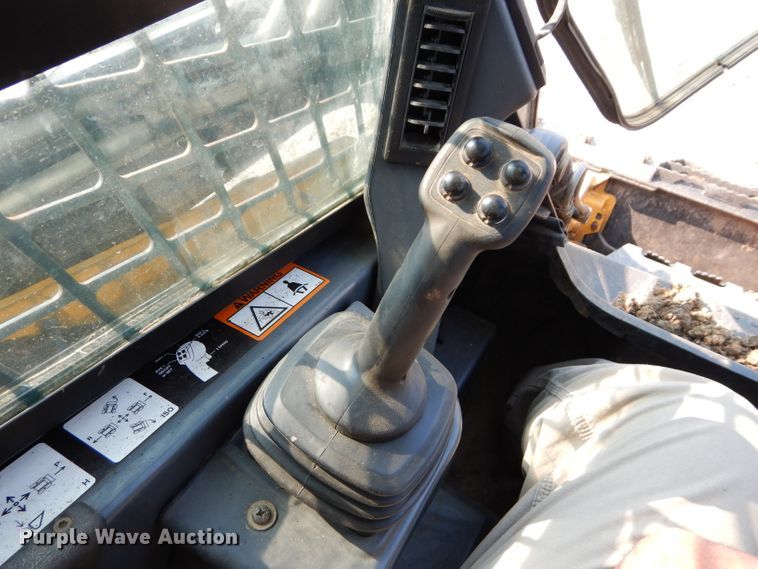 image for item DM4326 2011 John Deere 333D  tracked skid steer loader