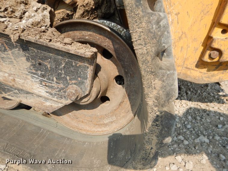 image for item DM4326 2011 John Deere 333D  tracked skid steer loader