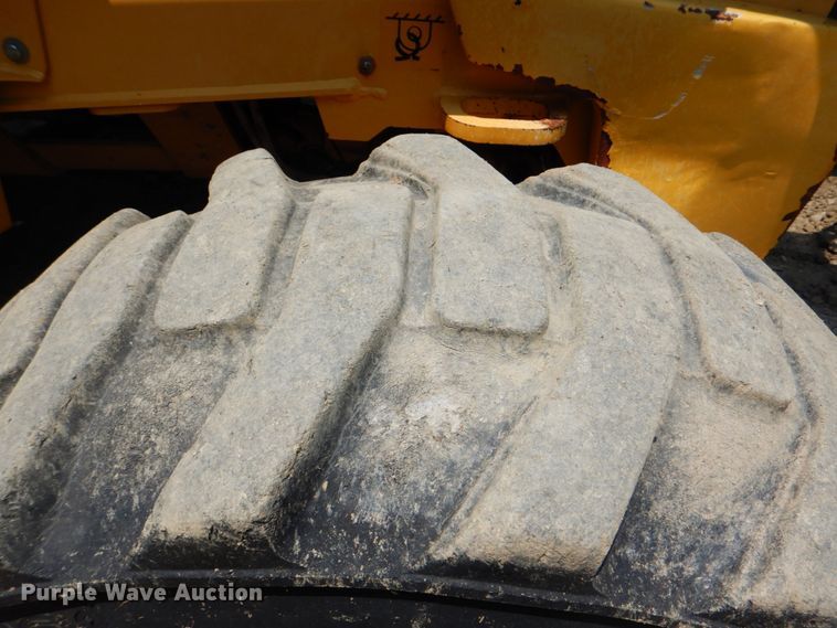 image for item HT9361 2012 John Deere 310K  backhoe