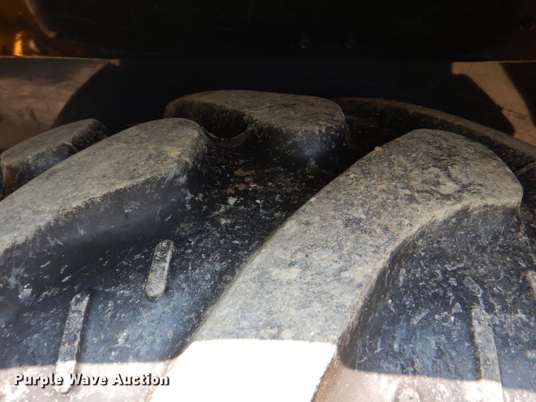 image for item HT9361 2012 John Deere 310K  backhoe