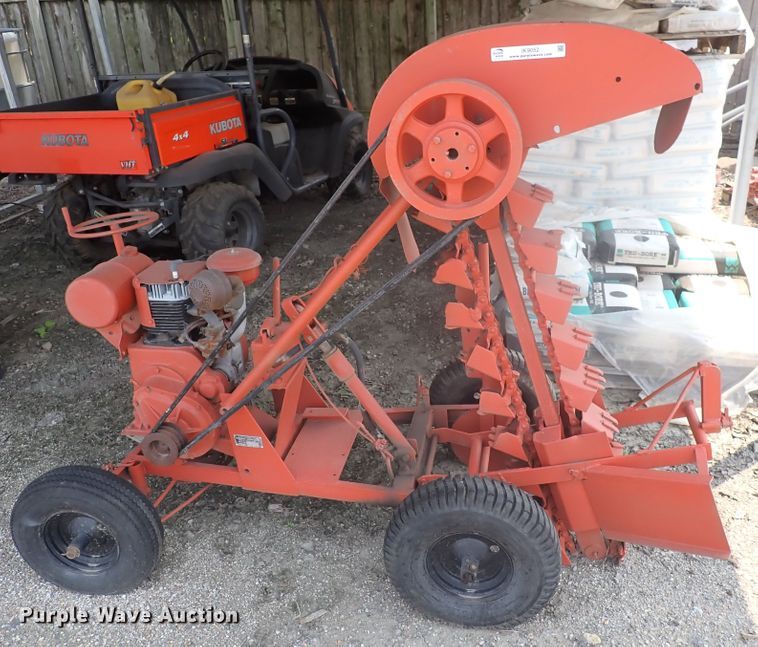 image for item IK9052 Charles Machine Works  bucket trencher