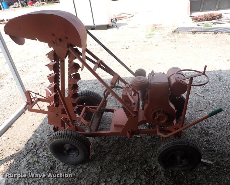 image for item IK9052 Charles Machine Works  bucket trencher