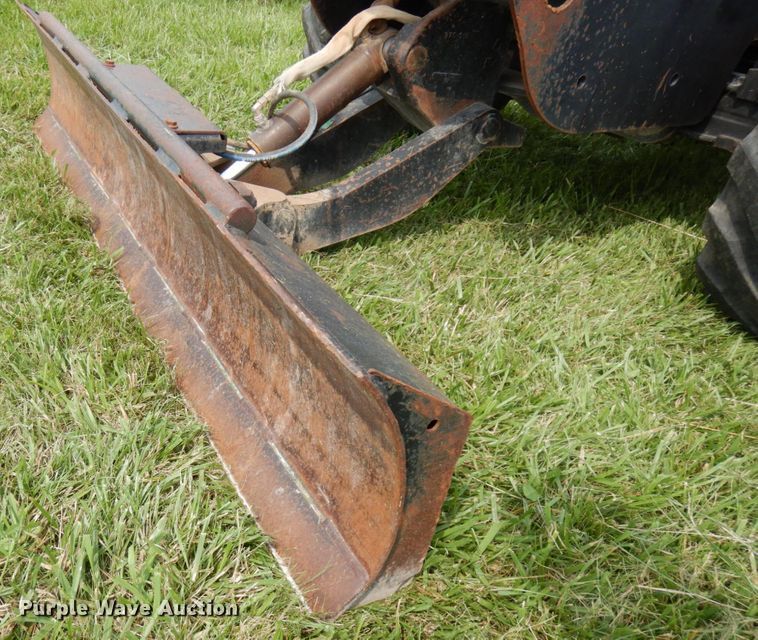 image for item IL9916 2004 Ditch Witch RT55  rock saw