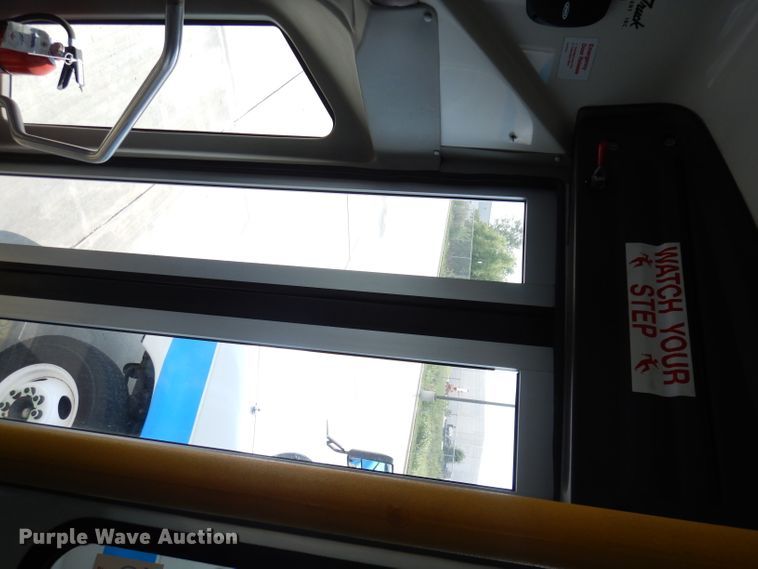 image for item DG0735 2010 Ford E450 Super Duty ElDorado  shuttle bus