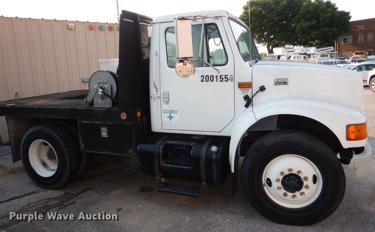 image for item ID9002 2001 International 4900  flat bed truck