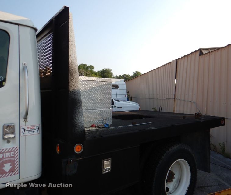 image for item ID9002 2001 International 4900  flat bed truck