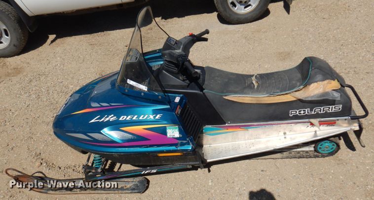 image for item JZ9911 1997 Polaris Lite Deluxe  snow mobile