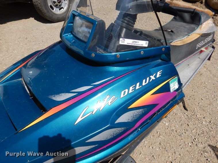 image for item JZ9911 1997 Polaris Lite Deluxe  snow mobile