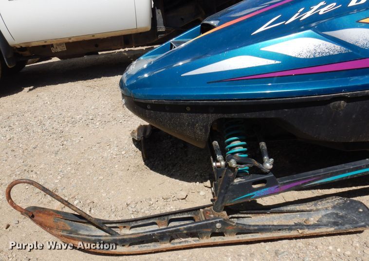 image for item JZ9911 1997 Polaris Lite Deluxe  snow mobile