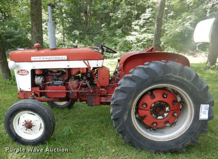 image for item DL0098 International 340 Utility  tractor