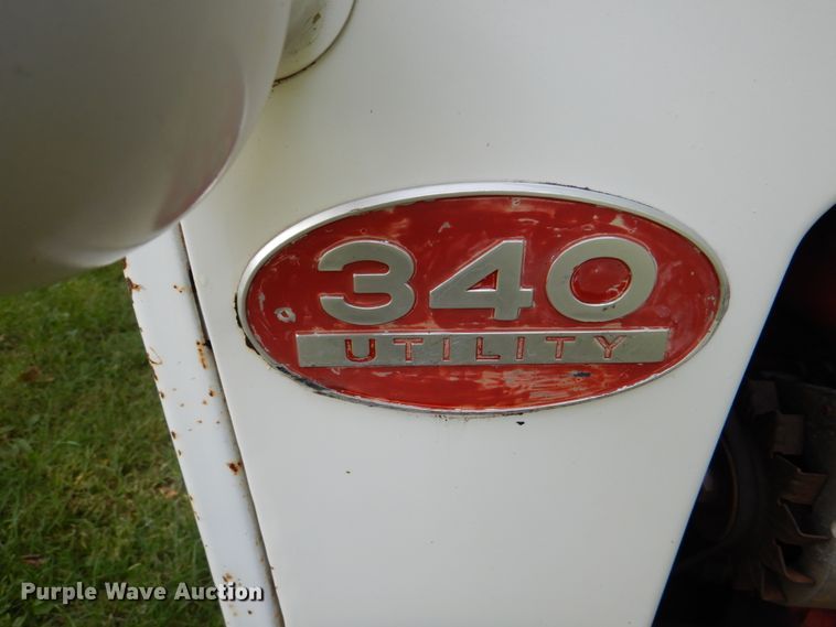 image for item DL0098 International 340 Utility  tractor