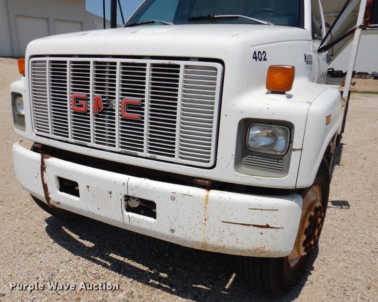 image for item IQ9703 1994 GMC TopKick C6500  seed tender truck